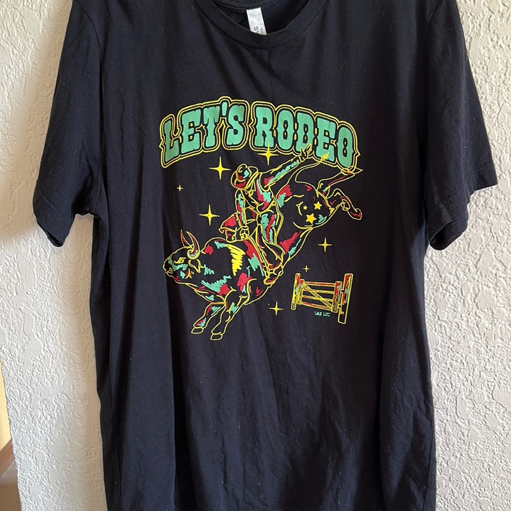 Women’s “Let’s Rodeo” t-shirt. Size L